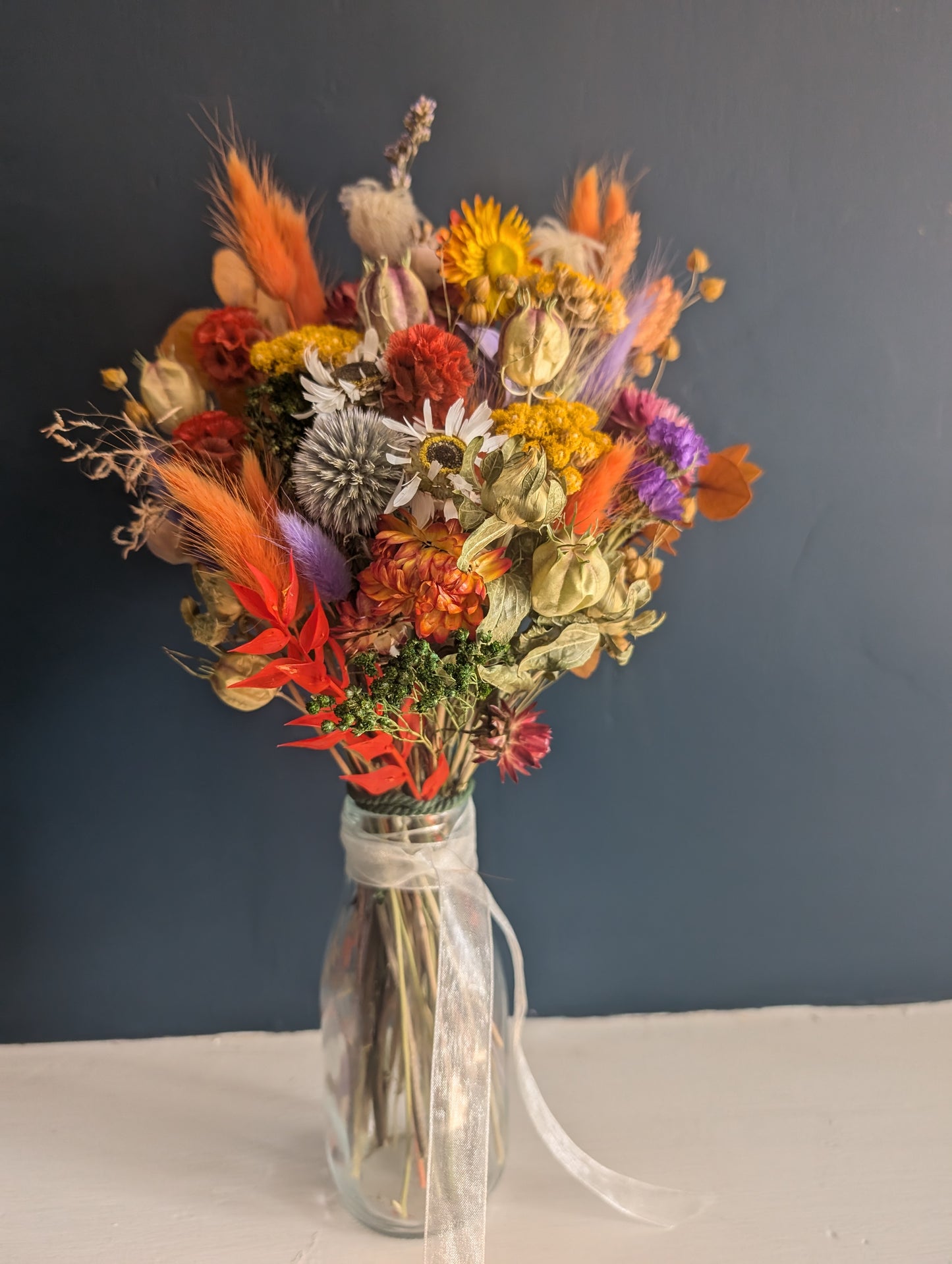 Autumn dried flowers milk bottle