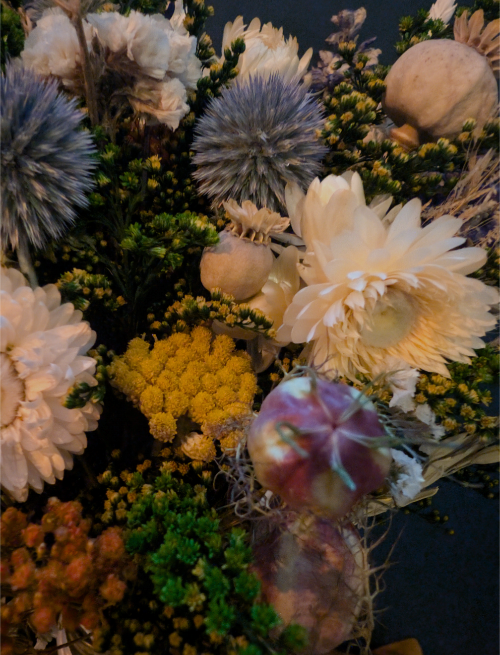 Enchanted Forest posy in milk bottle