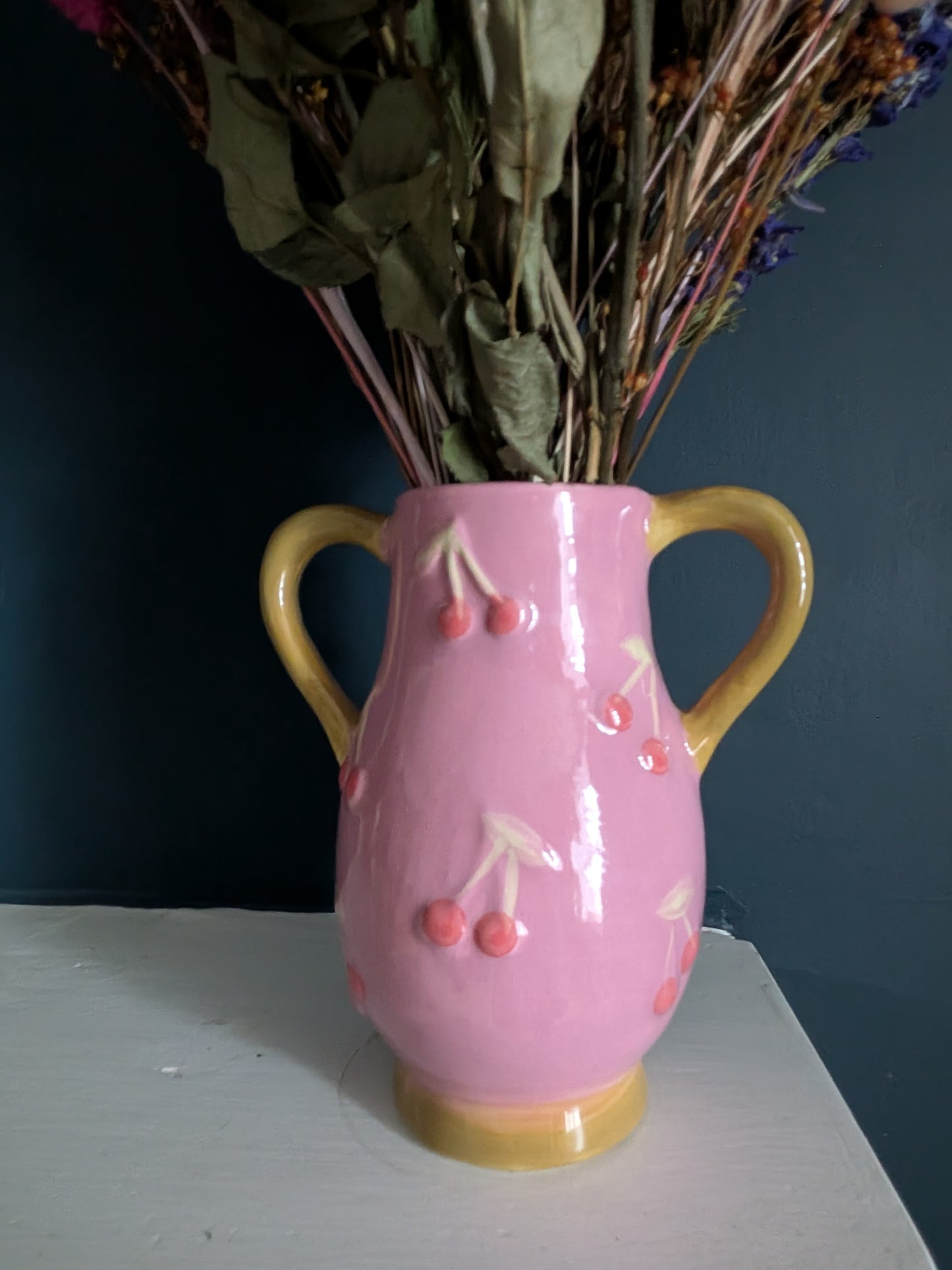 Whimsical Dried Flower Arrangement in Cherry Vase